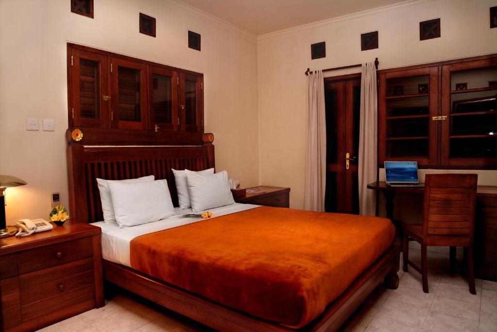 Taman Ayu 212 Hotel Denpasar Værelse billede